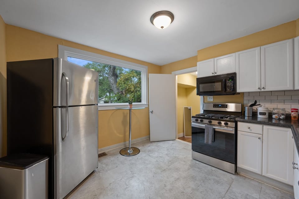 Bungalow kitchen with large picture window.