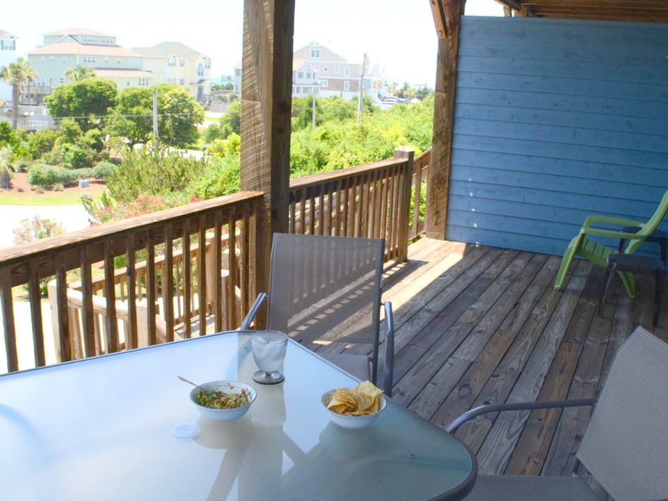 Bottom deck has table and chairs, perfect for relaxing outside