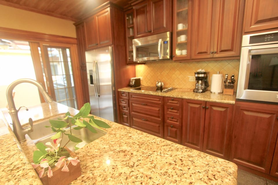 Fully appointed kitchen with tons of supplies,  cookware,  everything you need