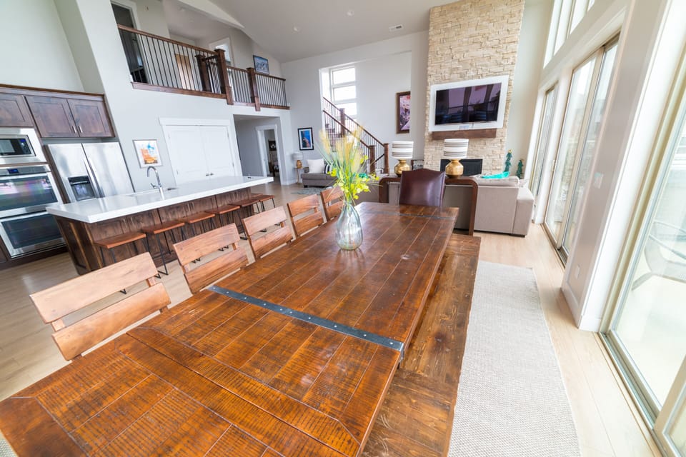 Big table that seats up to 14 with up to 6 around the island.  Tons outside too.