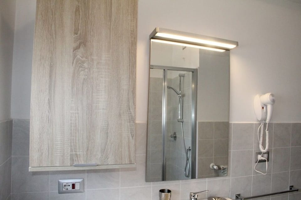 Apartment, 2 Bedrooms | Bathroom | Shower, designer toiletries, hair dryer, towels