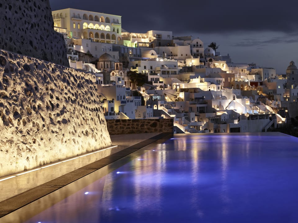 Outdoor pool, an infinity pool, sun loungers