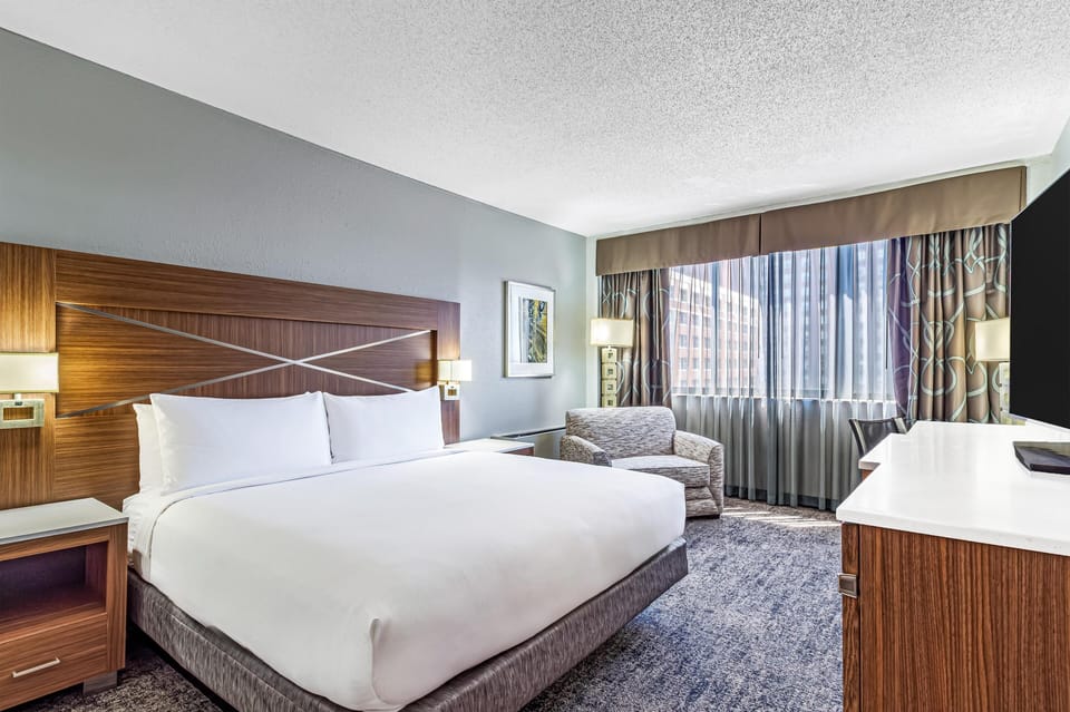 Premium bedding, down comforters, pillowtop beds, in-room safe