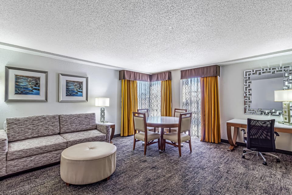 Executive Suite, 1 King Bed with Sofa bed, Non Smoking | Living area | 50-inch LCD TV with digital channels, TV