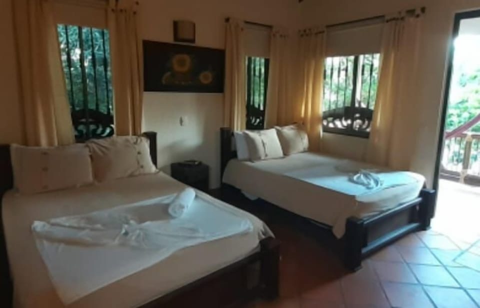 Family Triple Room, Multiple Beds | 1 bedroom, minibar, in-room safe, free WiFi