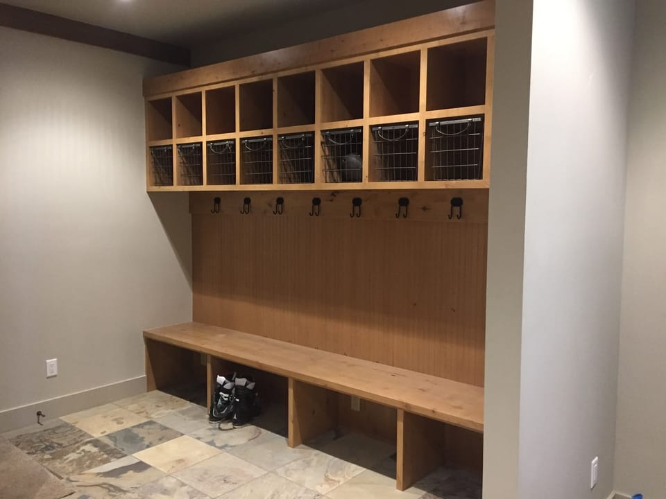 Mud Room with space for coats and gear.  Separate Ski/Snowboard storage
