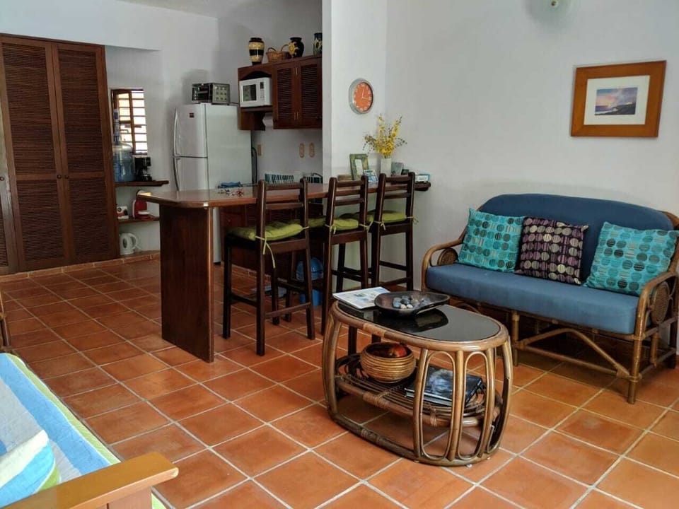 Enter from private patio into living-dining-kitchen combo. AC + Ceiling fan. 