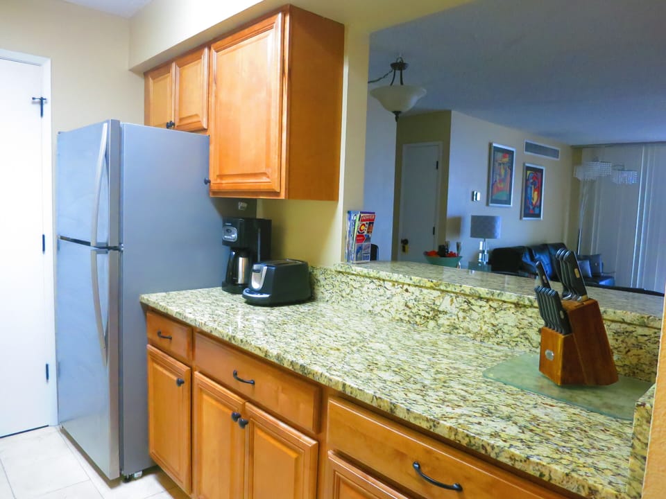 THE KITCHEN IS UPDATED WITH GRANITE  COUNTERS AND STAINLESS STEEL APPLIANCES