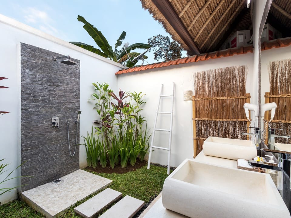 Family Villa, 4 Bedrooms, Pool View | Bathroom | Shower, rainfall showerhead, free toiletries, bathrobes