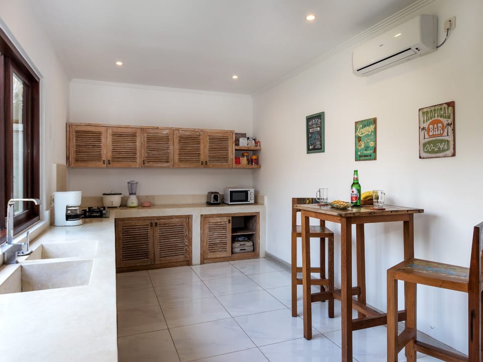 Family Villa, 4 Bedrooms, Pool View | Private kitchen | Fridge, microwave, stovetop, coffee/tea maker