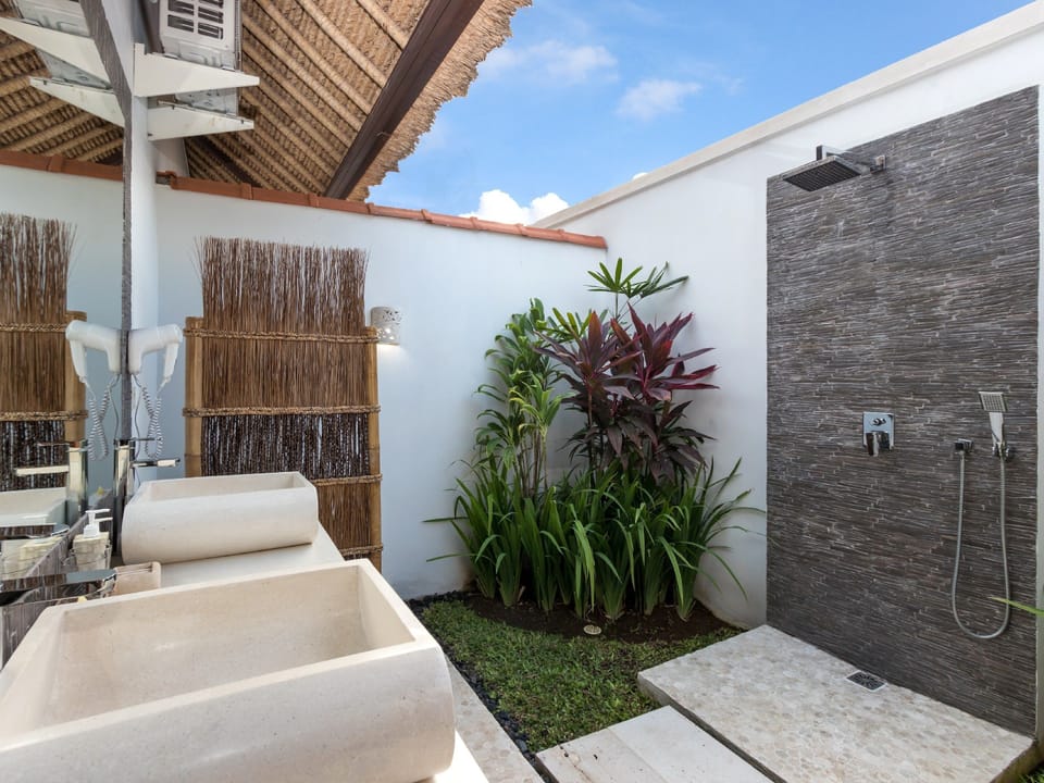 Family Villa, 4 Bedrooms, Pool View | Bathroom | Shower, rainfall showerhead, free toiletries, bathrobes