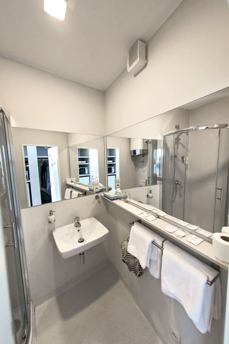 Shower, free toiletries, hair dryer, towels