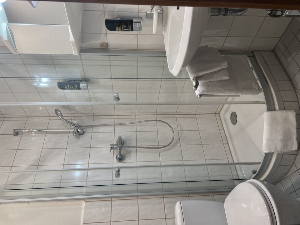 Shower, free toiletries, hair dryer, towels