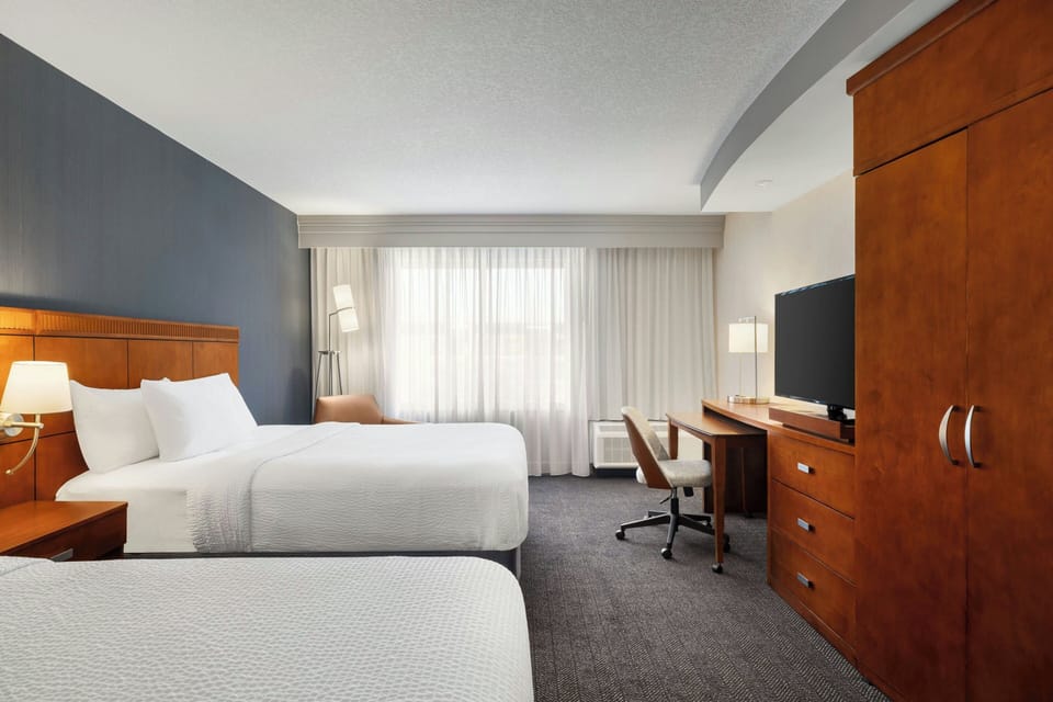 Room, 2 Queen Beds | Desk, iron/ironing board, free rollaway beds, free WiFi