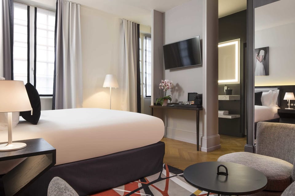 Deluxe Double Room | Premium bedding, in-room safe, soundproofing, iron/ironing board