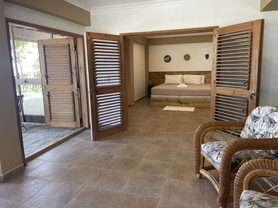 Family Apartment, 2 Bedrooms, Kitchen, Beachfront | In-room safe, free WiFi, bed sheets