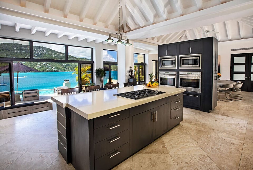 The spacious and well-appointed kitchen with 2 Sub-Zero fridges, 2 Wolf ovens, and 2 microwaves.