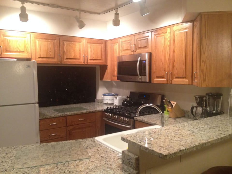 New gas range, kitchen countertops and cabinets from a 2015 remodel
