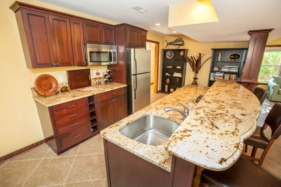 Nothing like a nice wet bar that walks out to the backyard pool and hot tub.