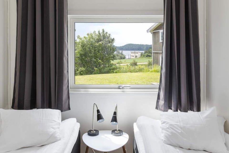 Triple Room, 3 Twin Beds, Shared Bathroom | Blackout drapes, cribs (surcharge), rollaway beds (surcharge)