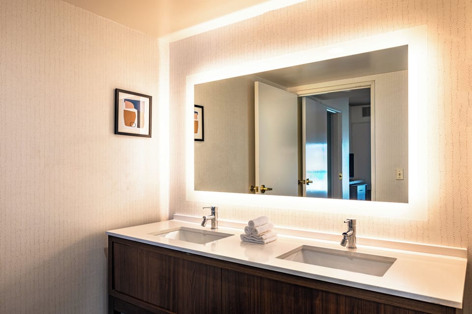 Suite, 1 King Bed | Bathroom | Hair dryer, towels