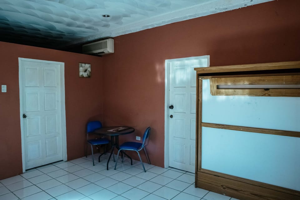 Family Apartment, 1 Bedroom, Patio, Ground Floor | In-room dining