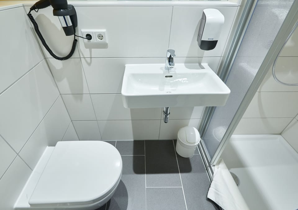 Shower, free toiletries, hair dryer, towels