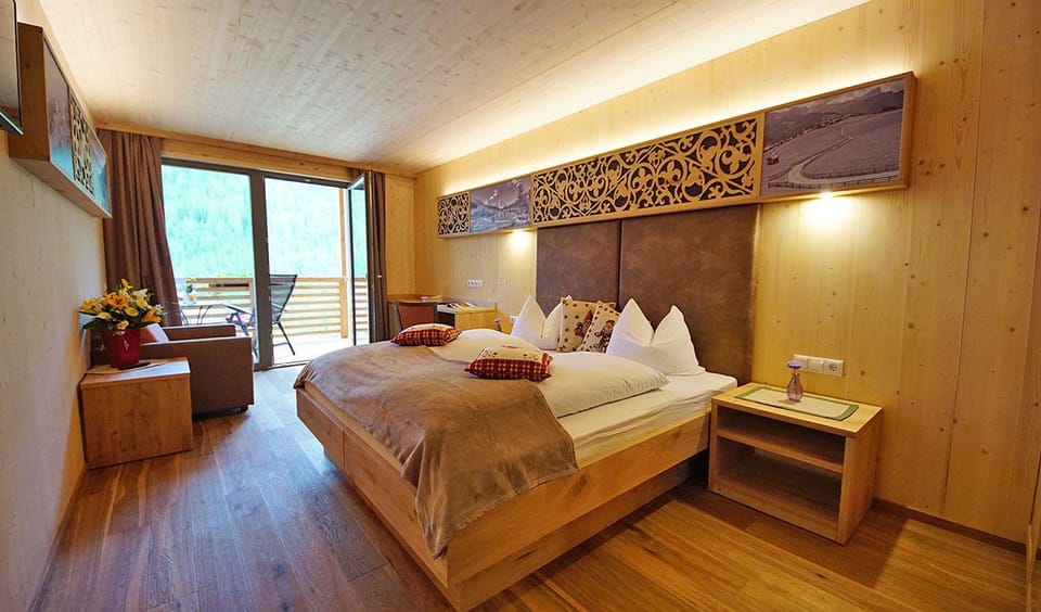 Superior Chalet, Mountain View | Minibar, in-room safe, desk, blackout drapes