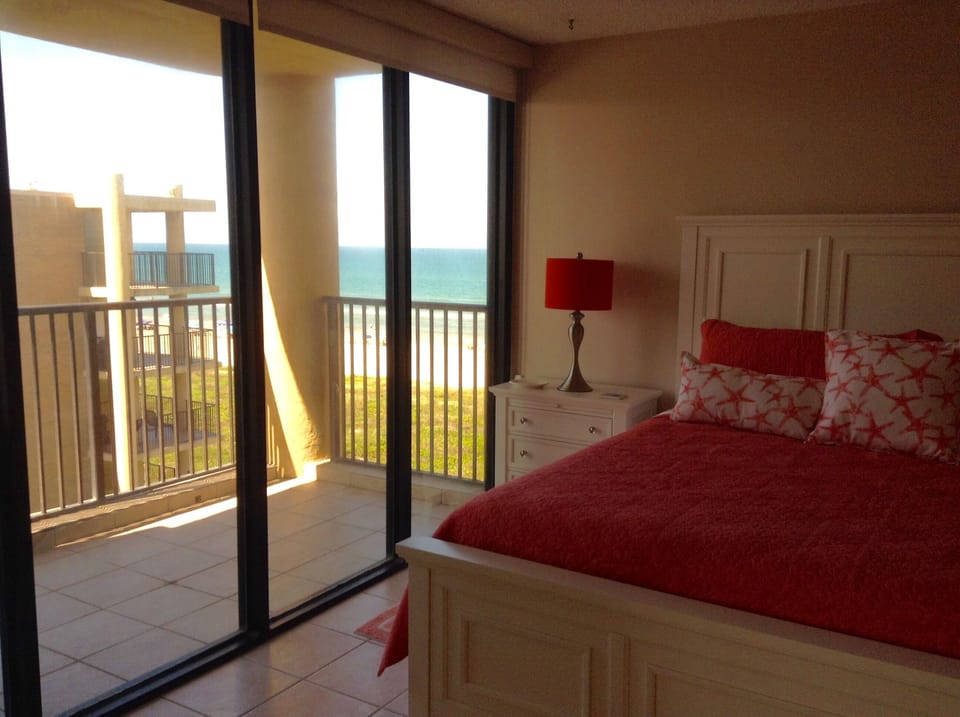 Master Suite has a wall of windows.