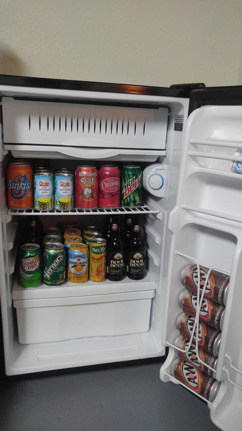 Fully stocked mini-fridge downstairs for home theater.