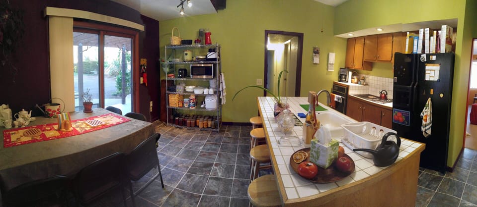 Kitchen and dining area, with door to rear patio