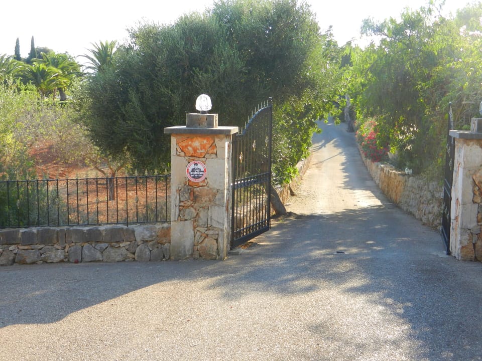 Entrance. Electric gates and drive to the house.