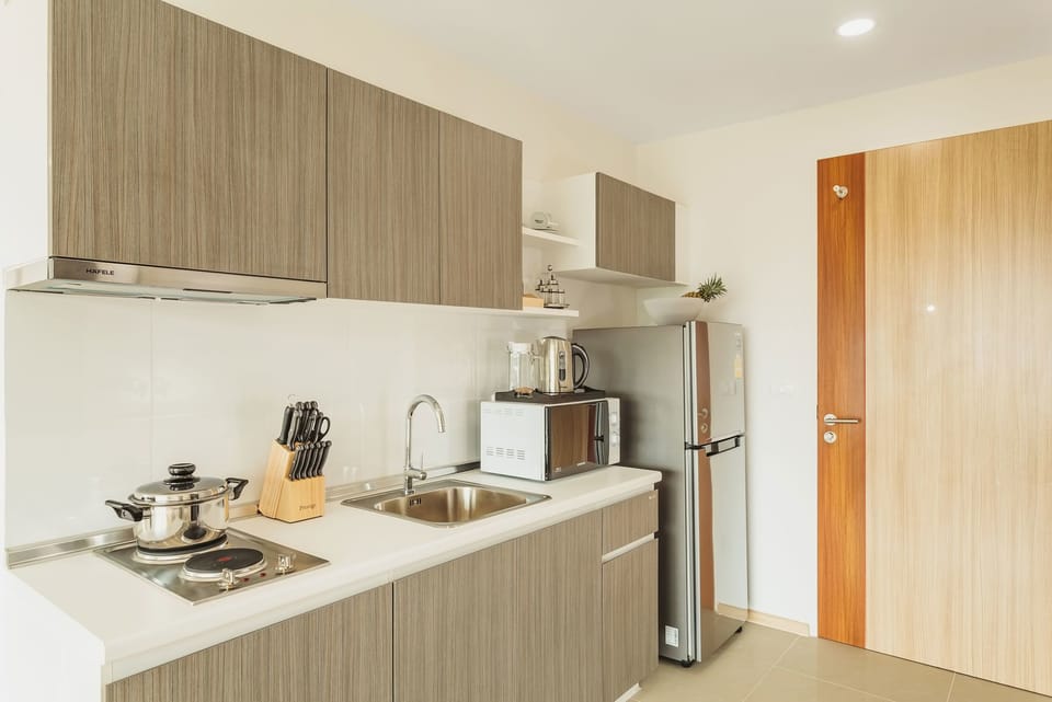 Studio, 1 Bedroom | 1 bedroom, in-room safe, blackout drapes, iron/ironing board