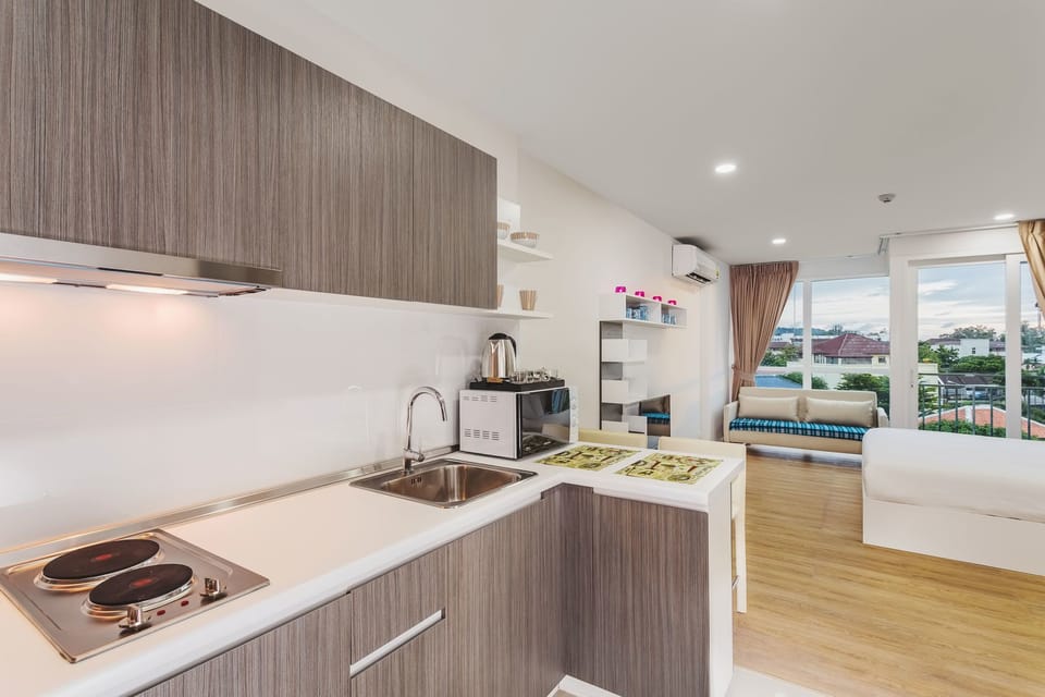 Standard Condo, 1 Bedroom | Private kitchen | Fridge, microwave, stovetop, electric kettle