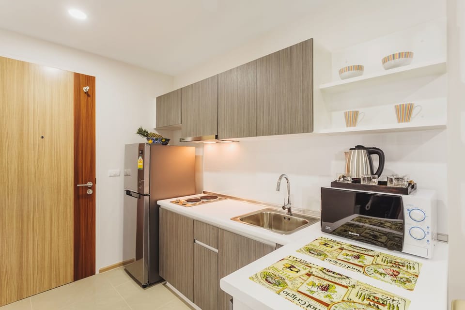 Standard Condo, 1 Bedroom | Private kitchen | Fridge, microwave, stovetop, electric kettle