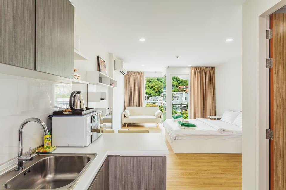 Condo, 1 Bedroom | 1 bedroom, in-room safe, blackout drapes, iron/ironing board