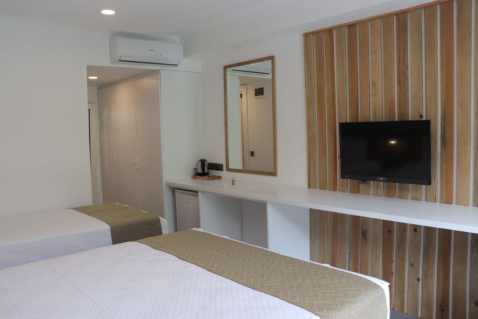 Deluxe Double or Twin Room | Minibar, in-room safe, desk, free WiFi