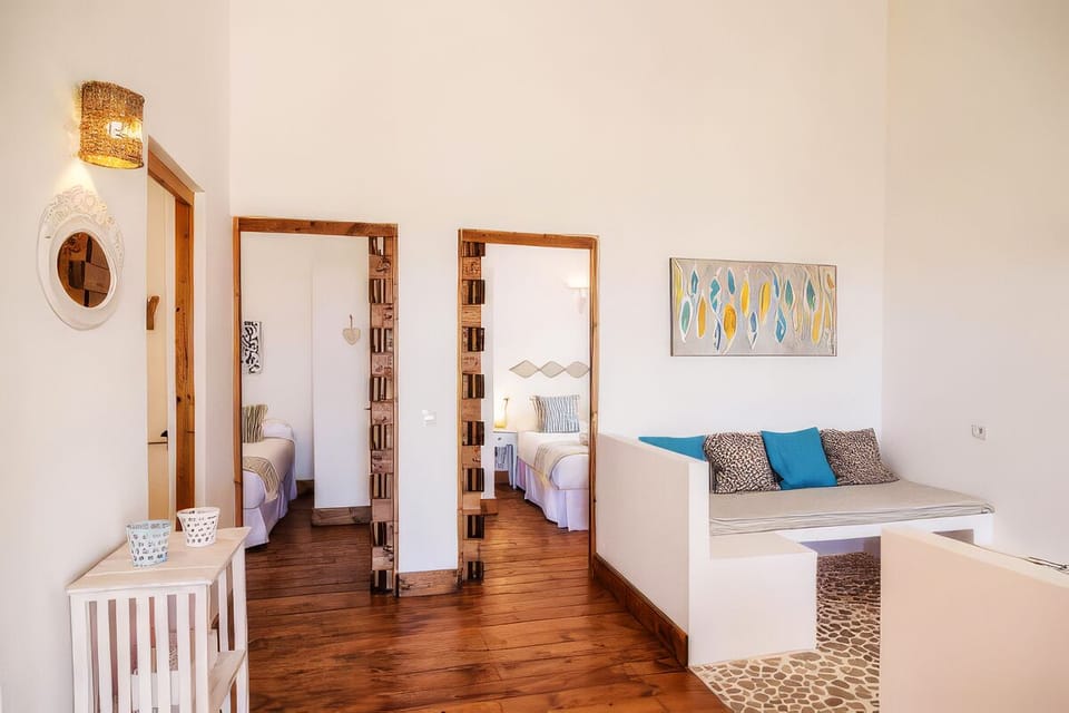 Standard Suite, 2 Bedrooms | Living area | TV
