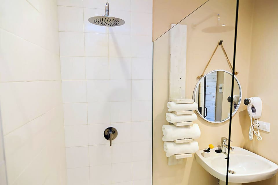 Shower, free toiletries, hair dryer, towels