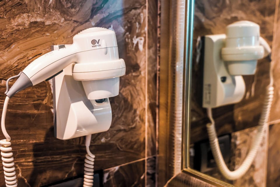 Shower, free toiletries, hair dryer, towels