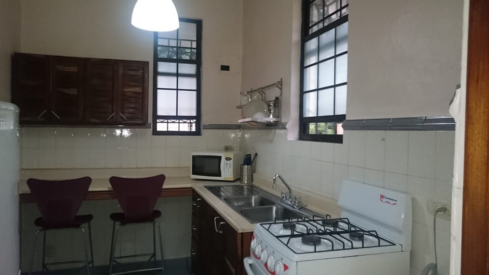 Business Studio, 1 Bedroom, Kitchen | Private kitchen | Full-size fridge, microwave (on request), stovetop