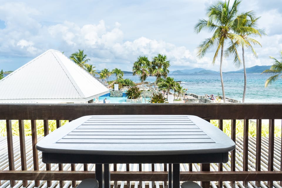 The second-floor condo overlooks the pool...