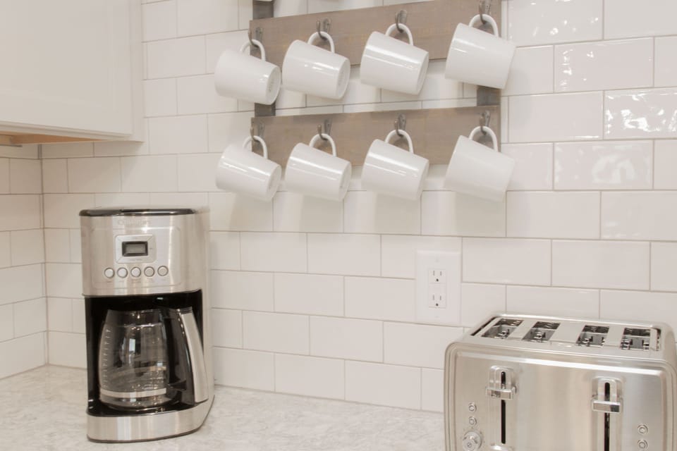 Coffee Bar:full-size machine, & two Keurigs. Kcups  not provided.
