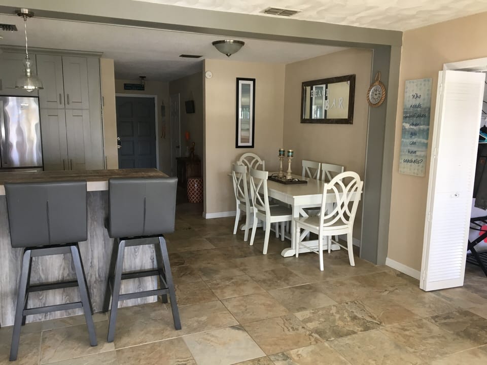 Dining for 6. Kitchen seats a total of 12 people. 