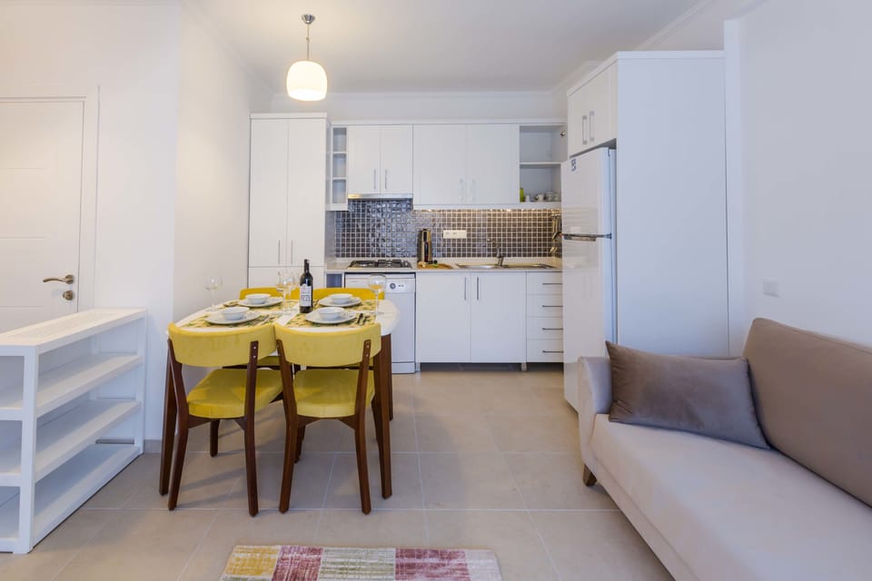 Deluxe Apartment, 1 King Bed with Sofa bed | Living area | 80-cm LCD TV with satellite channels, TV