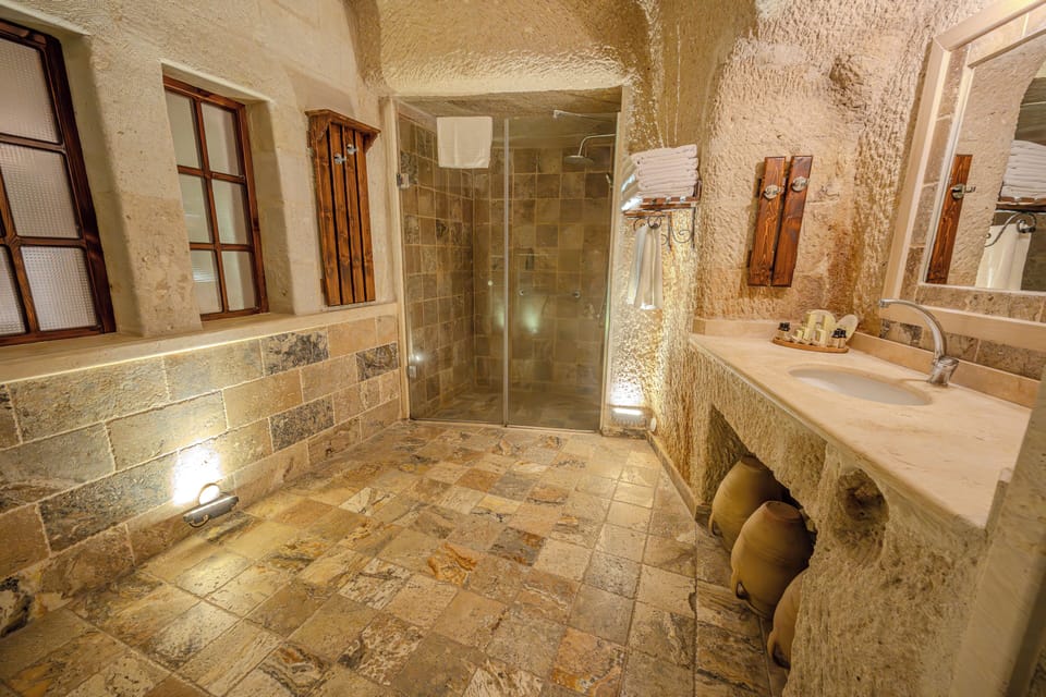 Family Room, Courtyard Area | Bathroom | Shower, free toiletries, hair dryer, slippers