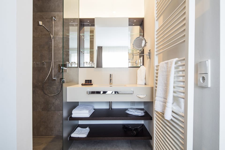 Shower, free toiletries, hair dryer, bathrobes