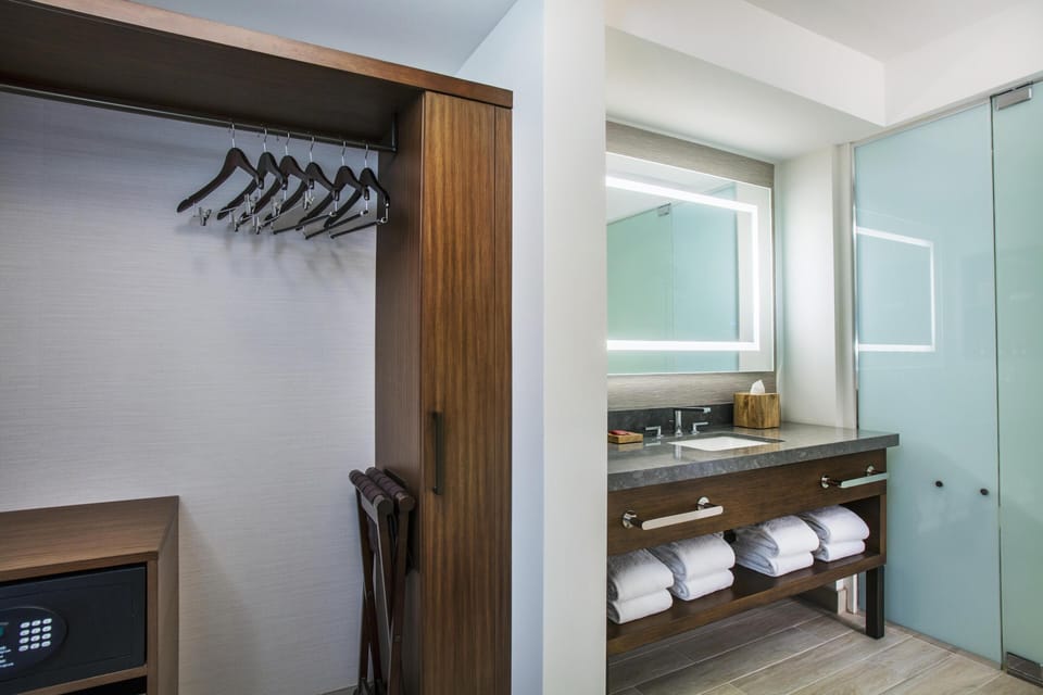 Room, 1 King Bed with Sofa bed, Ocean View, Corner | Bathroom | Hair dryer, bathrobes, slippers, towels