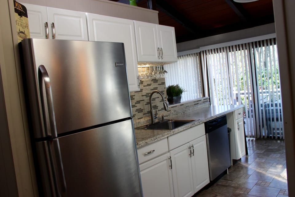 Fully equipped kitchen with stainless steel appliances