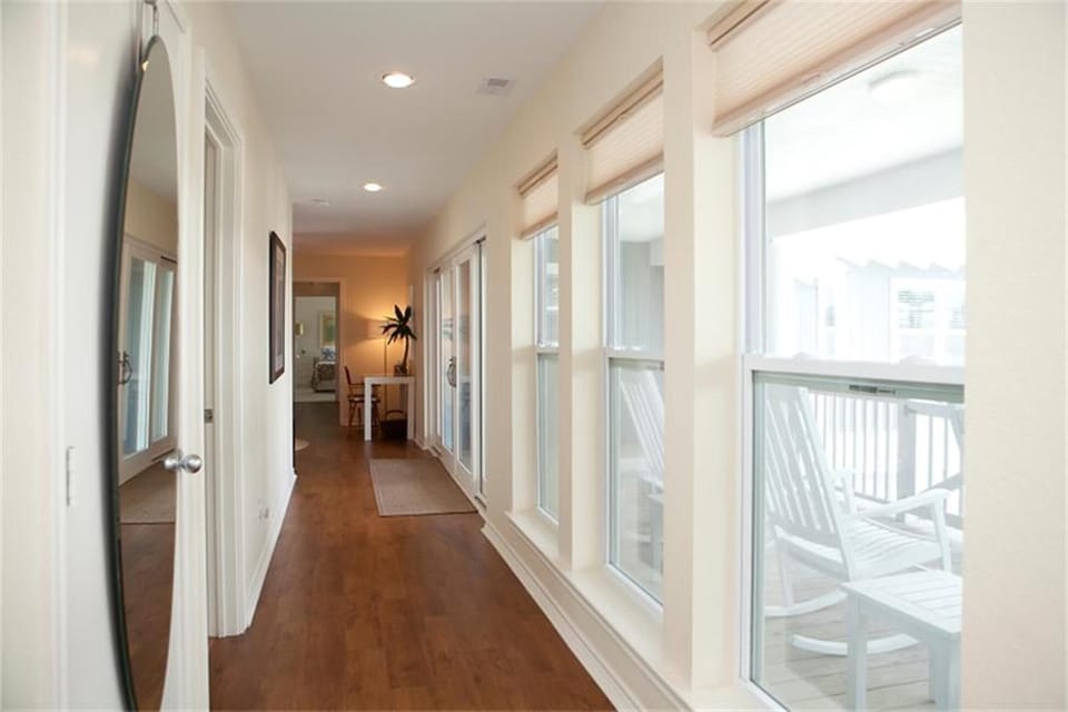 Hallway with all of the bedrooms.